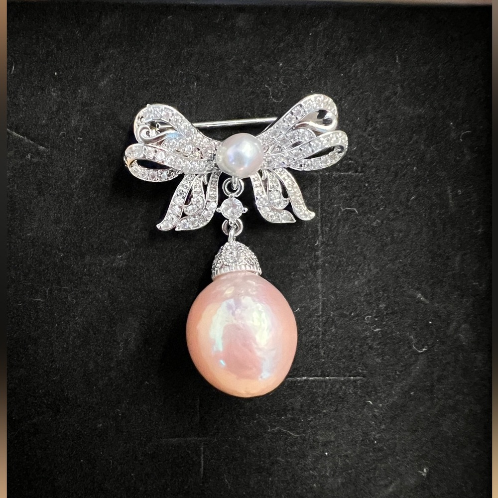 Vintage Elegant Silver Bow Brooch with Pink Pearl Drop